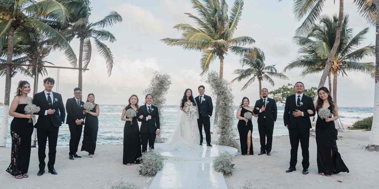 The bride and the groom with their bridesmaid and groomsmen
