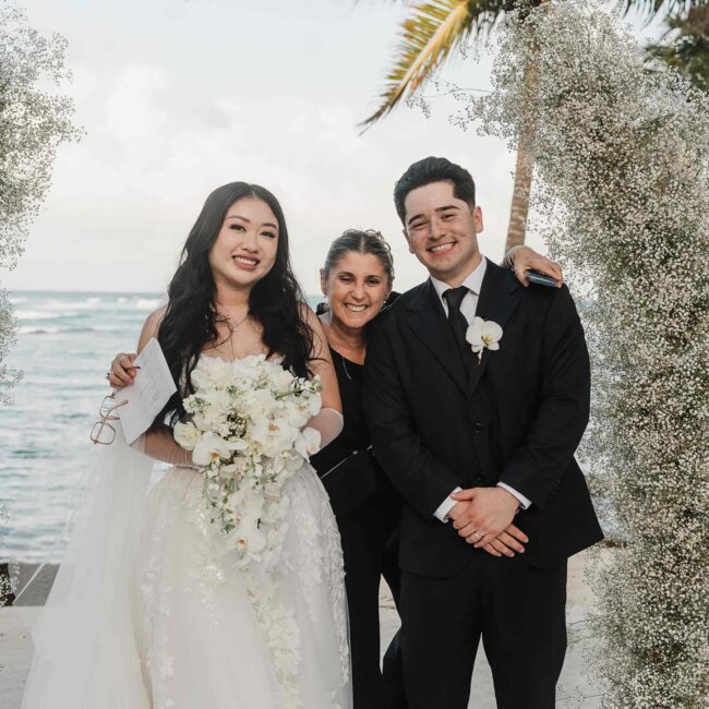 Maryta Osorio with the bride and groom