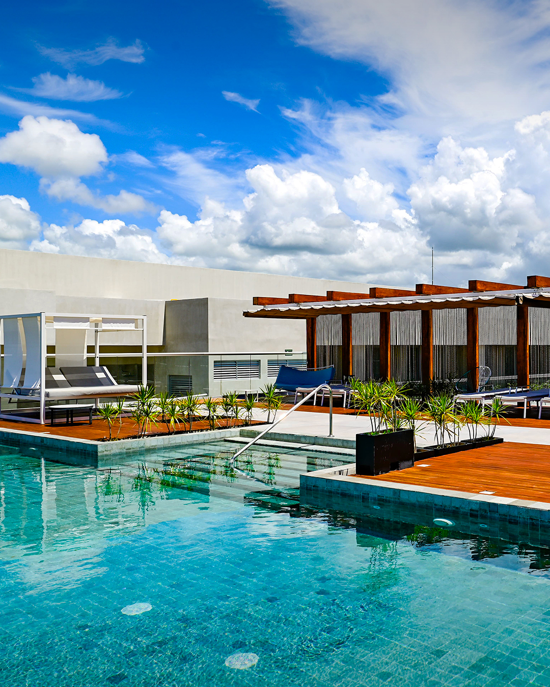 Modern rooftop pool at Aloft Playa del Carmen wedding hotel on 5th Avenue