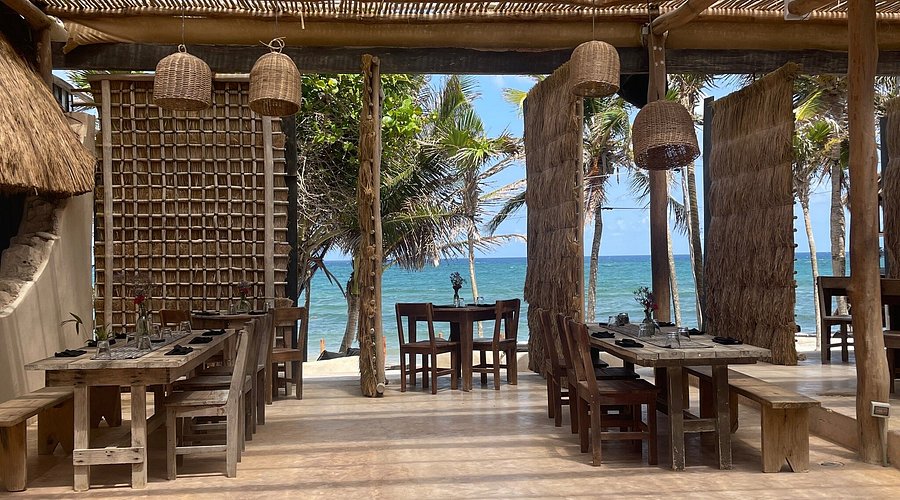 Bohemian beachfront reception space at Papaya Playa Project wedding venue in Tulum