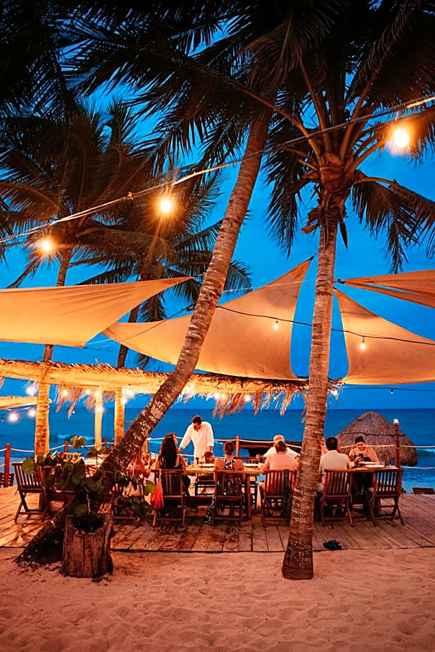 Romantic beachfront reception at Petit Lafitte boutique wedding venue near Playa del Carmen