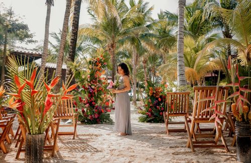 Private wedding ceremony setup at Petit Lafitte beach venue in Playa del Carmen