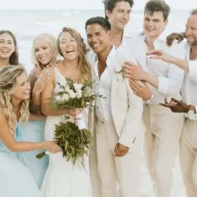 Bridesmaids and groomsmen photo at the beach in Riviera Maya