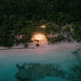 Night aerial view of Saasil Kantenah private beachfront wedding venue in the Riviera Maya
